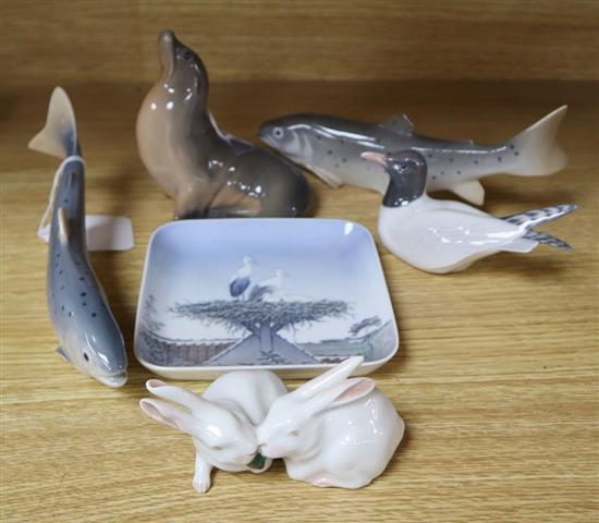 Five Royal Copenhagen figures, Sealion, Salmon (x 2), Tern and Rabbits and a Bing & Grondahl stork tray (6)
